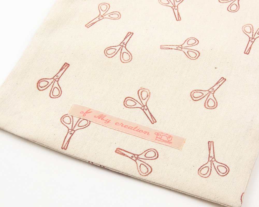 Etichette termoadesive con il nome